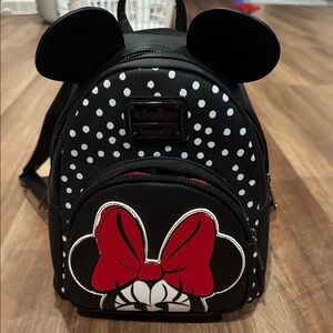 Loungefly Black and White Polka Dot Backpack with Red Bow